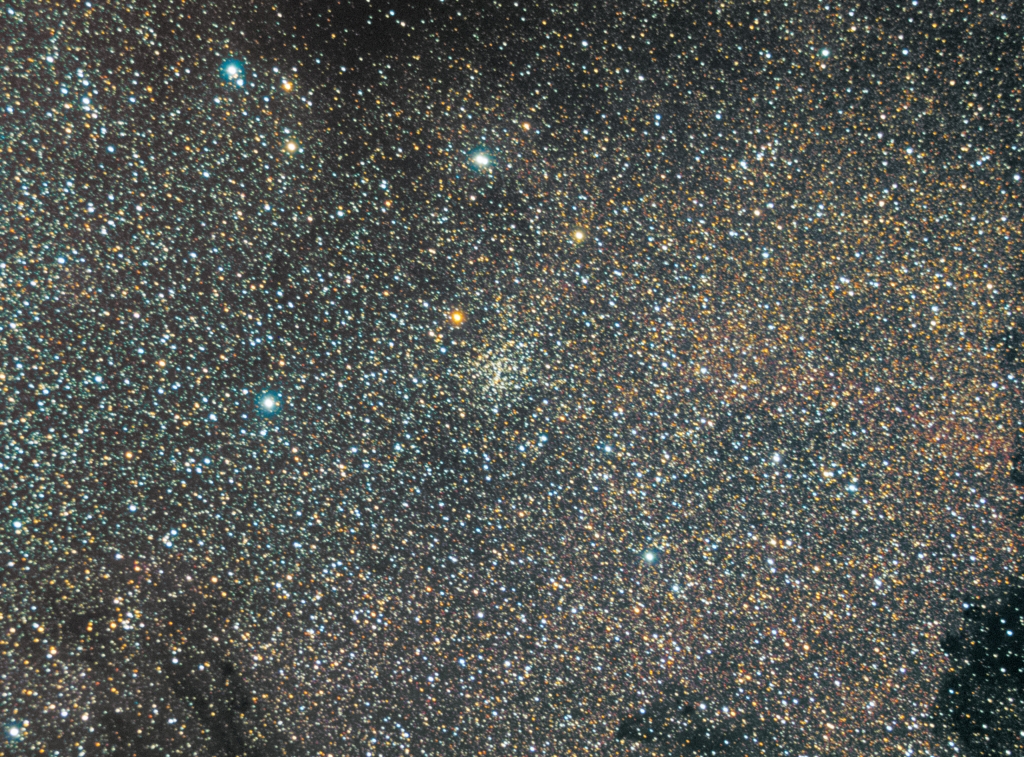Messier 24 - "Small" Sagittarius Star Cloud
Messier 24 is an enormous cloud of stars lying in the Sagittarius arm of our galaxy, at a distance of about 10,000 light years from Earth.  It is about 600 light years wide and occupies an area 90 arc minutes in apparent diameter.  Among other objects, M24 contains the open cluster NGC 6603, which is at the center of this image.   M24 is called the Small Sagittarius Star Cloud because there is another, larger star cloud south of it in Sagittarius, consisting of stars not obscured by the interstellar dust which blocks our view of the center of the galaxy. 
