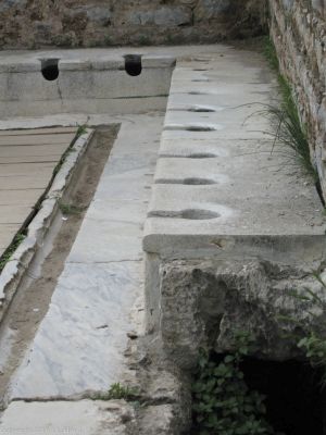 Latrines
Pay Toilets, not coin-operated.  An adjunct to the Scolastica Baths, located next to the Temple of Hadrian.
Keywords: Ephesus;latrines;privy;sanitation;toilets