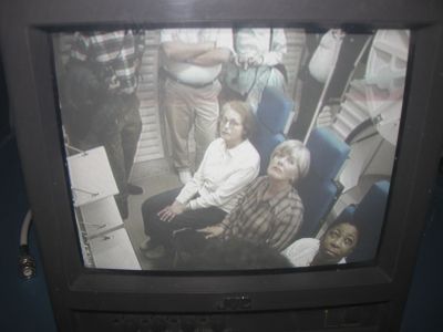 Nervous passengers on the Space Shuttle Discovery
Elouise Mattox, Pam Bloxham and Pat Bush going for a ride in the Space Shuttle, no doubt wondering who is spying on them from the camera overhead.
Keywords: Izmir;Space Camp Turkey;Turkey March 2006