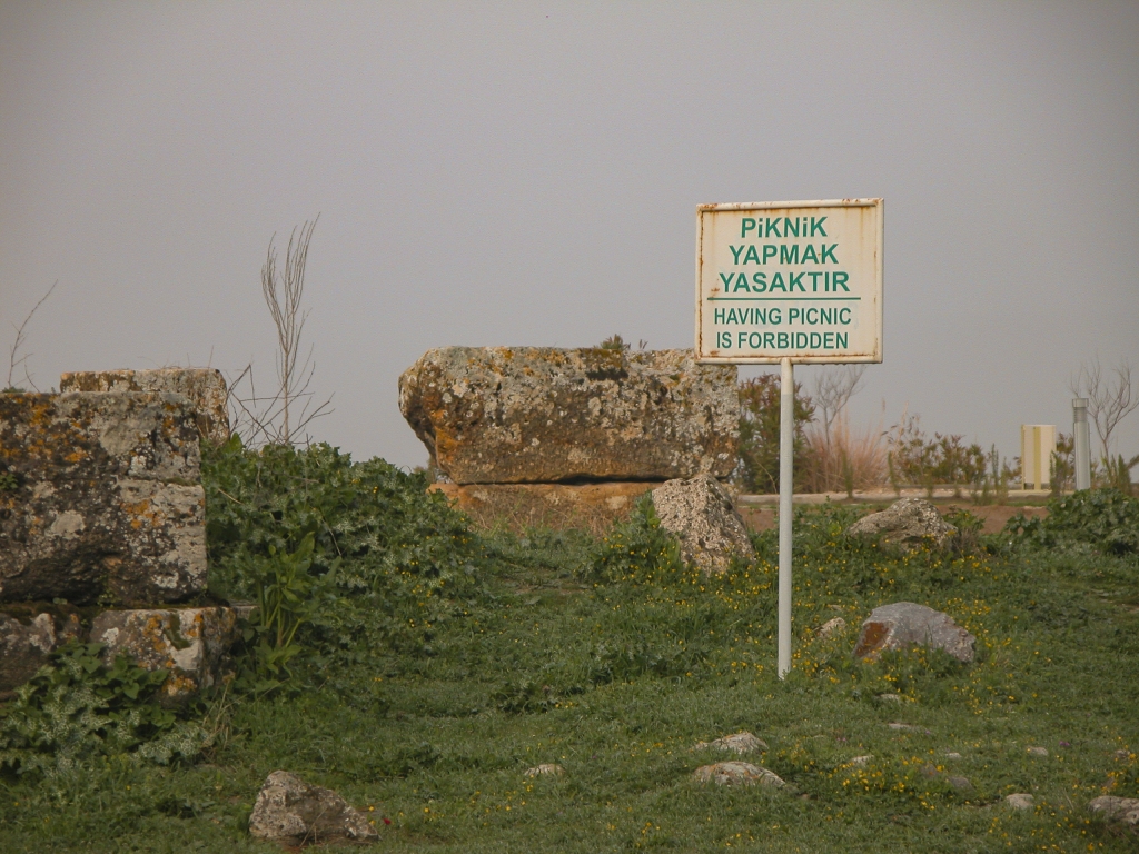 No Picnicking
Picnics were decidedly frowned on in Hierapolis.  I'm glad they printed the sign in English, because Turkish, being a non-Indo-European language, is tough to figure out.  I might have thought it meant something like "Official Picnic Area."

