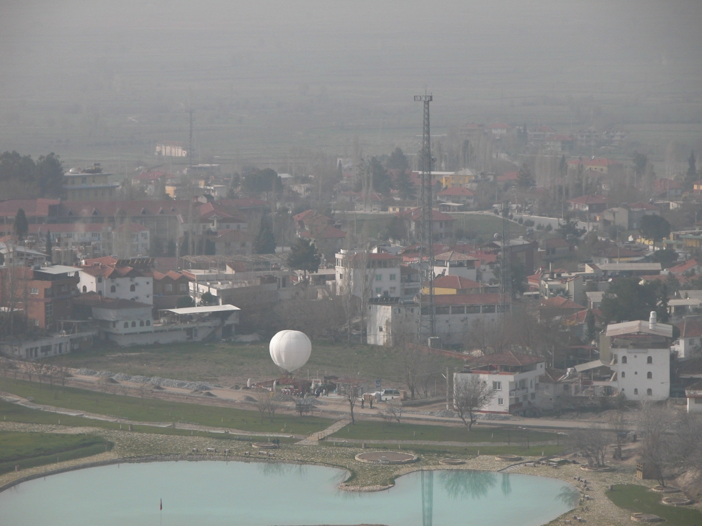 Pamukkale Village
The town at the foot of the cliffs is shrouded in mist.
