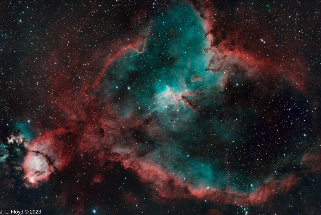 The Heart Nebula
Emission nebula in Cassiopeia, 7500 light-years away from Earth.  The Fish-head Nebula is also seen as a cancerous outgrowth from the Heart Nebula at lower left.
