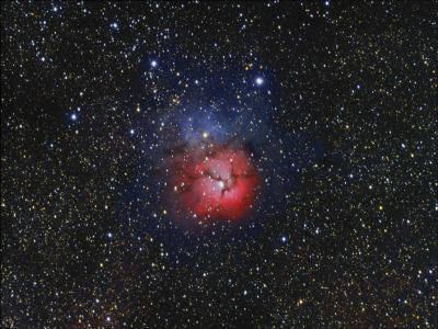 M20 - The Trifid Nebula
A combination of an open cluster of stars, an emission nebula (the lower, red portion), a reflection nebula (the upper, blue portion) and a dark nebula (which accounts for the gaps dividing the nebula into lobes).  About 5000 light-years away in the constellation Sagittarius.
