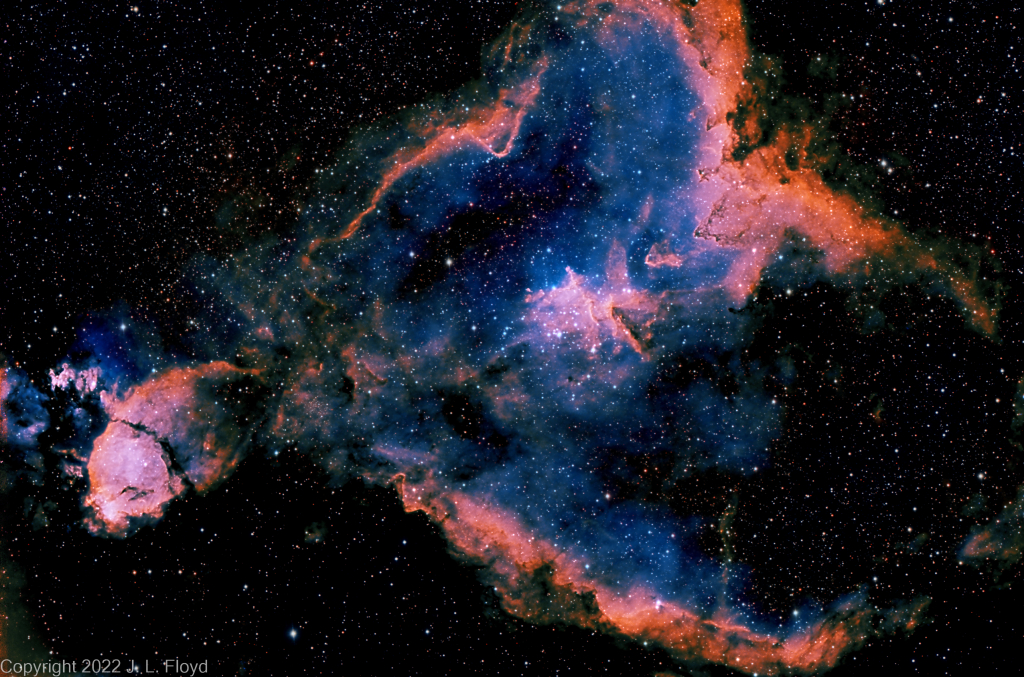 IC1805 - The Heart Nebula, narrowband version
Narrowband rendition of the Heart Nebula, using the IDAS NBZ nebula enhancement filter to capture the H-alpha and O-III emissions; Fish Head Nebula seen as extension of Heart at lower left.
