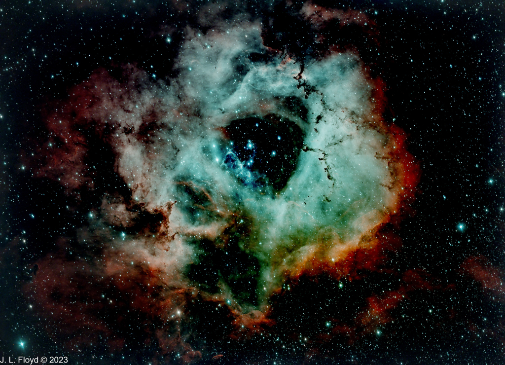 Sharpless2-275 - The Rosette Nebula
HII region in the constellation Monoceros; distance 5,200 light-years from Earth.  Open cluster NGC2244, in the doughnut hole, provides the energy that makes the nebula glow.
