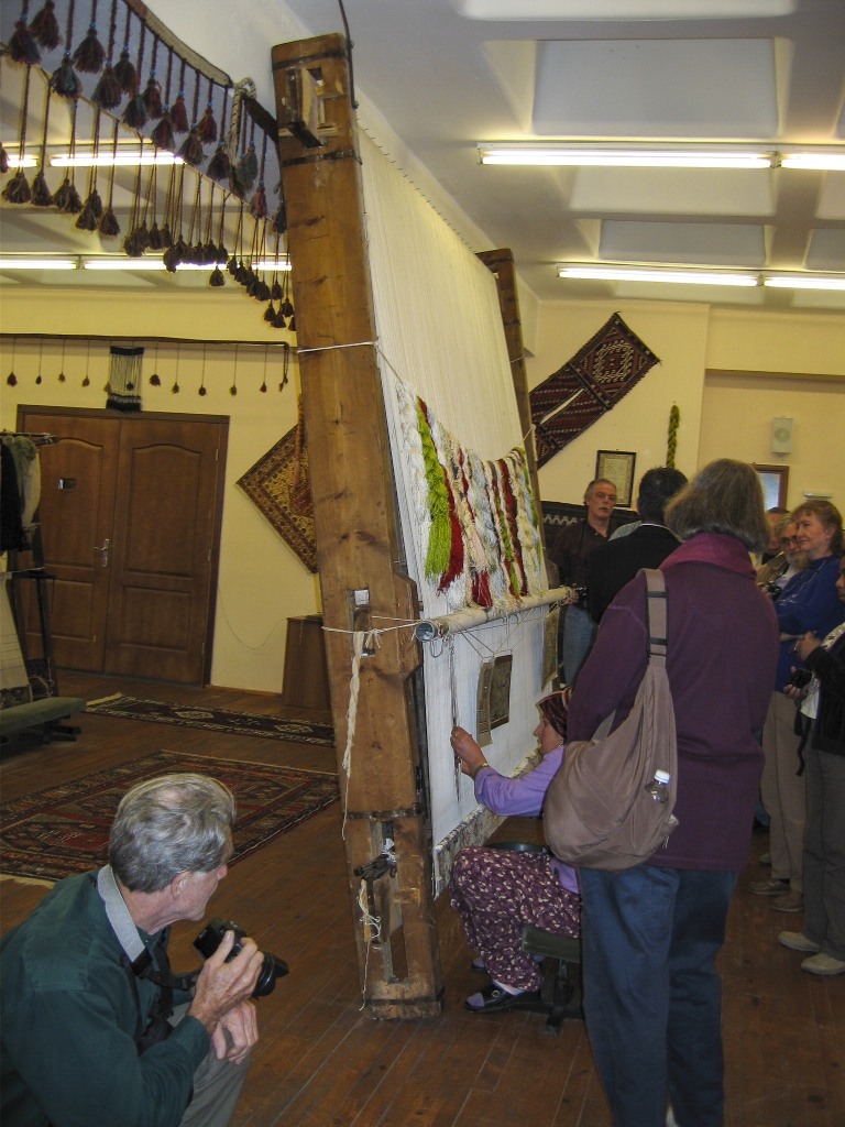 Weaving
Elouise and other members of our tour group watch as the weaver demonstrates the operation of the loom.
