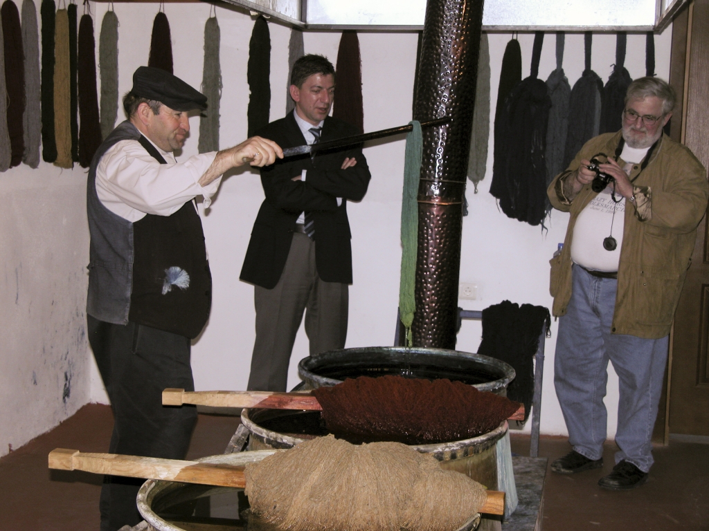 Green Threads
Al Treder watches as the dyemaster pulls a skein of thread out of the green vat.
