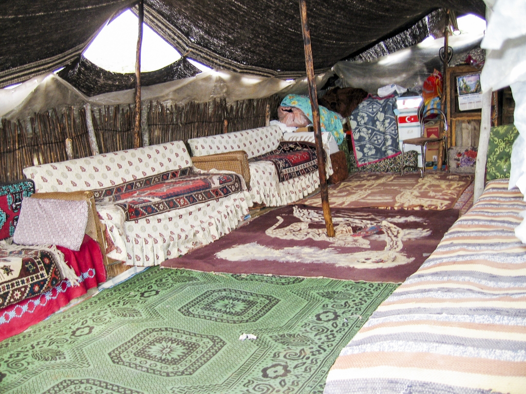 Nomad Living Quarters
A plethora of rugs helps keep the place warm in winter.
