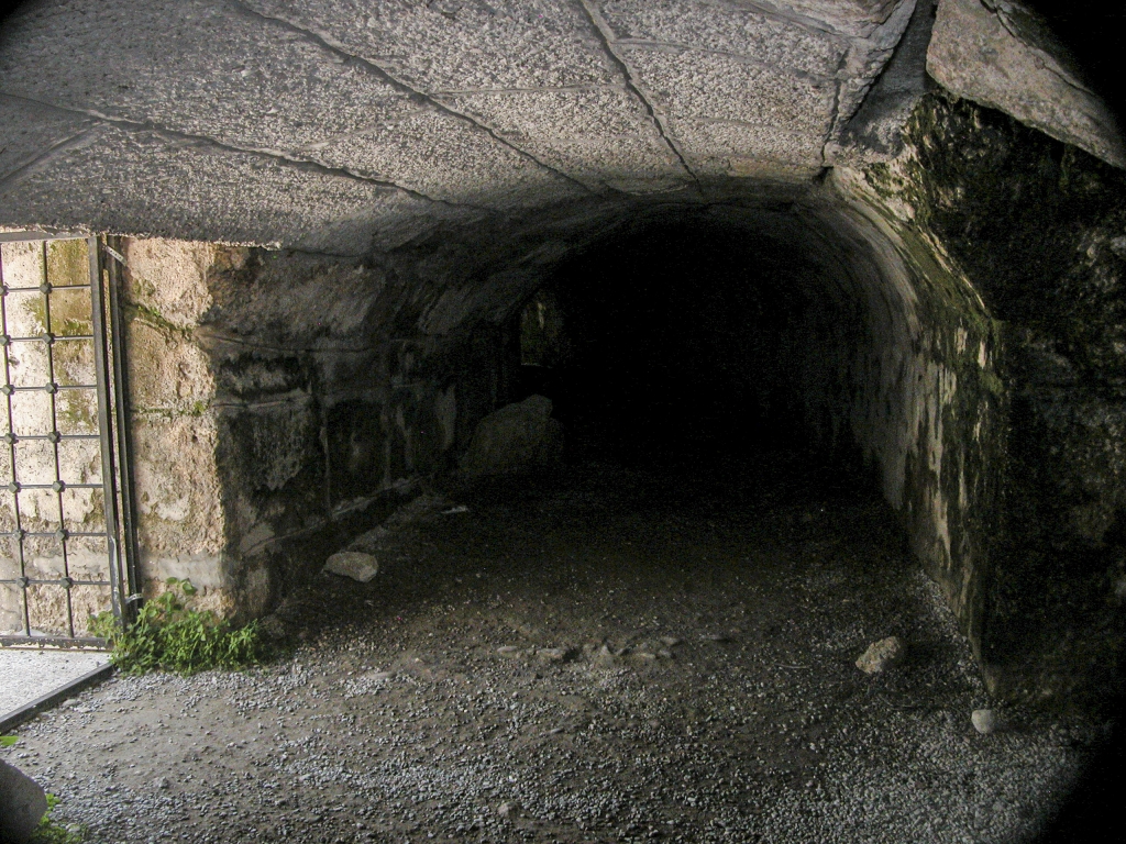 Tunnels
One of a number of passages leading to the seating area.
