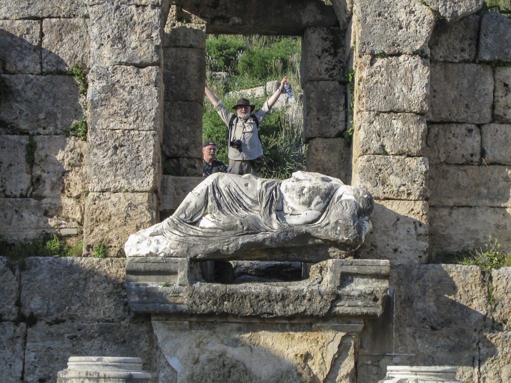 Desecration
A rude, unwashed barbarian celebrates his triumphant, sacrilegious intrusion into the sacred precincts of the Nymphaeum, as one of his fellow-heathens looks on approvingly. (At least he didn't damage any of the precious artifacts; previous barbarians had done that.)
