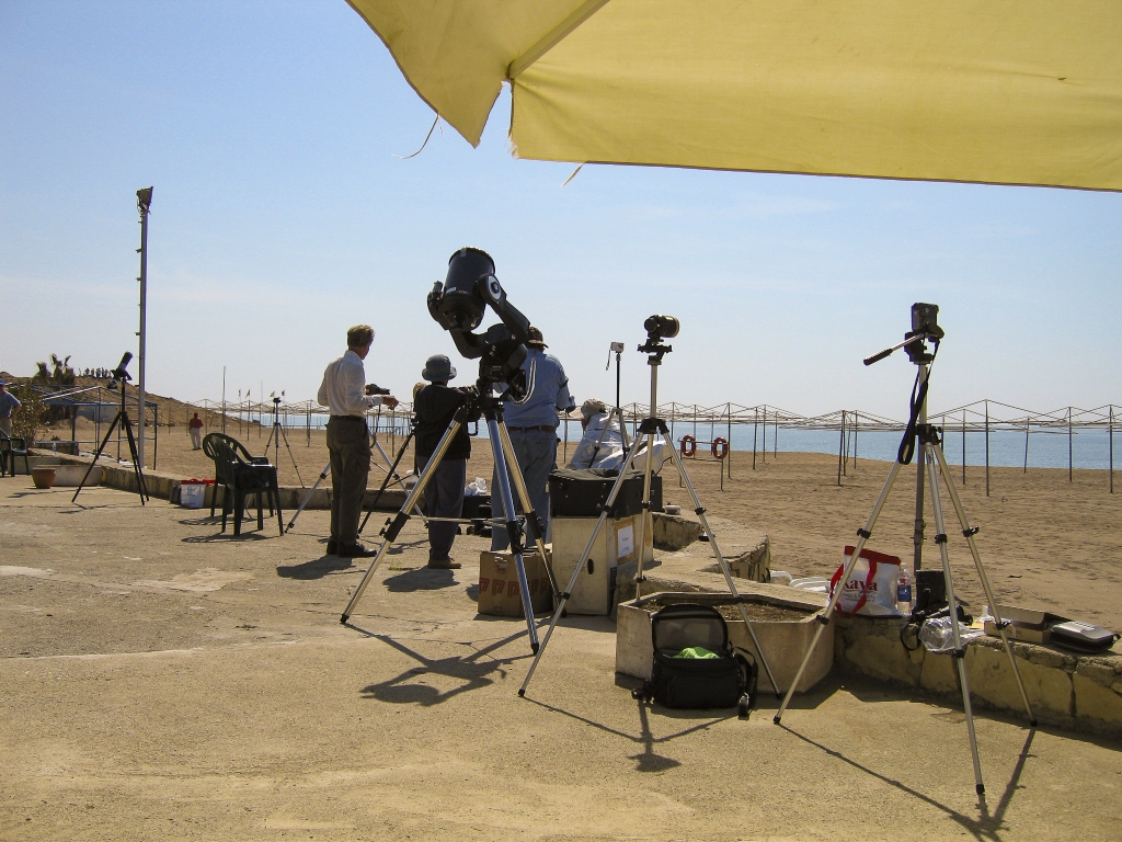 Shooting the Eclipse
Michelle Evans borrowed an 8" Meade LX-200 Schmidt-Cassegrain (large scope in center) from Space Camp Turkey for the eclipse, but it was for visual use only, no photography.  Some photographers were content with cameras on tripods (right of center).  Others didn't event bother with tripods.

