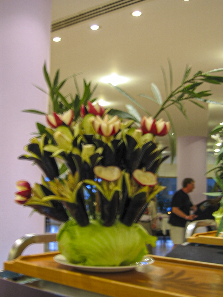 More Cabbage Flowers
There was a great variety of cabbage flowers.  These used carved radishes, zucchini squash carved to look like lilies, etc.  Incredible food artistry!
