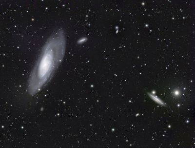 Messier 106 and companions
The large spiral galaxy at left is M106, lying at a distance of 22 to 25 million light-years from Earth in the constellation Canes Venatici.  A myriad of other galaxies are in the frame, of which the two most prominent are NGC 4248 (closest to M106) and NGC 4217 (disk at right).
