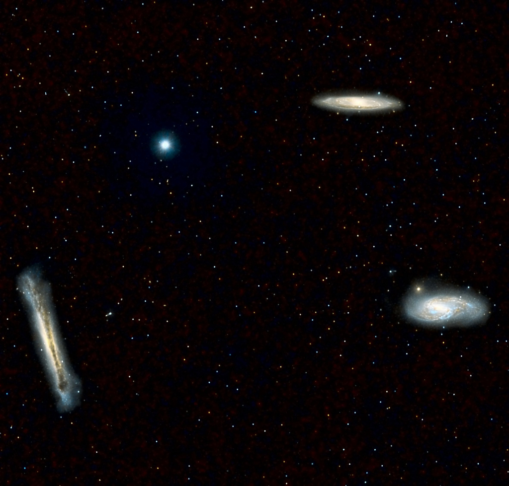 The Leo Galaxy Trio
A famous triplet of spiral galaxies:  Lower right - Messier 66; upper right, Messier 65; lower left, NGC 3628.  All about 35 million light years away in the constellation Leo the Lion.
