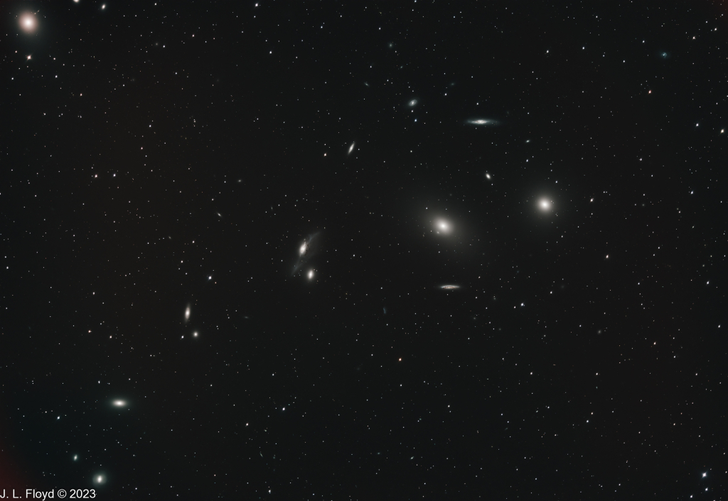 Markarian's Chain of Galaxies
A chain of galaxies in the Virgo Cluster, named after a Soviet astronomer.  Right to left:  M84, M86, NGC 4477, NGC 4473, NGC4461, NGC 4458, NGC4438 and NGC4435.
