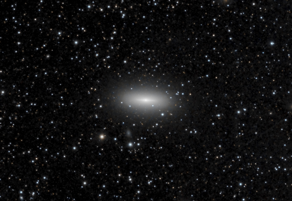 NGC 3115 - Lenticular Galaxy in Sextans
Formerly thought to be an elliptical galaxy, now considered a lenticular (lens-shaped) galaxy because it has a disk and a central bulge of stars, but no discernible spiral structure.  Distance from Earth is about 32 million light years.  It is several times larger than the Milky Way galaxy.
