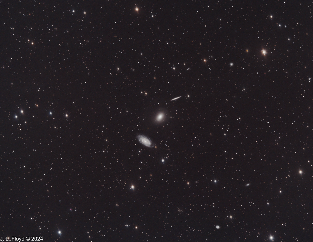 The Draco Trio of Galaxies
Three galaxies in Draco:  NGC 5981, edge-on spiral at top; in the middle, elliptical galaxy NGC 5982; bottom, spiral galaxy NGC 5985.
