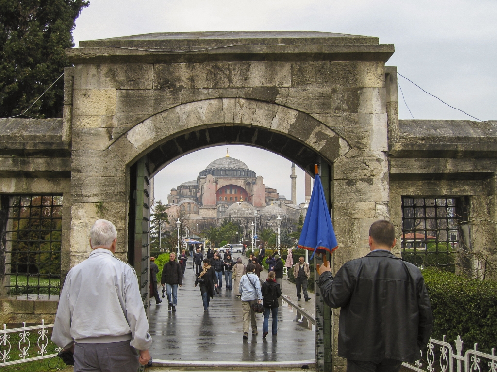 First Glimpse of Hagia Sophia
Marvin and Attila contemplate Hagia Sophia through the frame of a gateway to the forecourt of the Blue Mosque.
