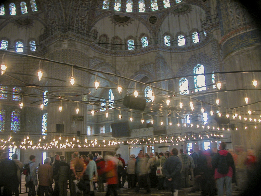 Illumination
Flash photography is not permitted in the Blue Mosque.  Even though artificial lighting supplements the natural light admitted through the stained-glass windows, it was still too dim for our cameras inside the mosque, so many of our pictures came out blurry.
