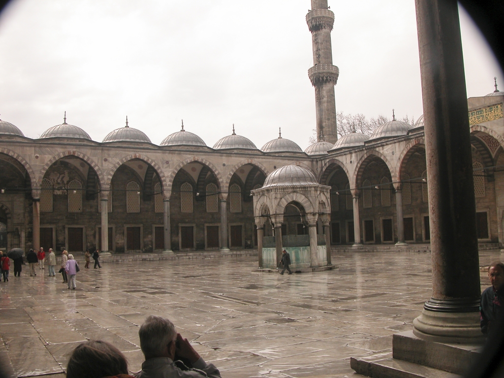 Courtyard of the Blue Mosque
The court is as large as the mosque itself and is surrounded by a continuous vaulted arcade.  The hexagonal structure in the center is a fountain.
