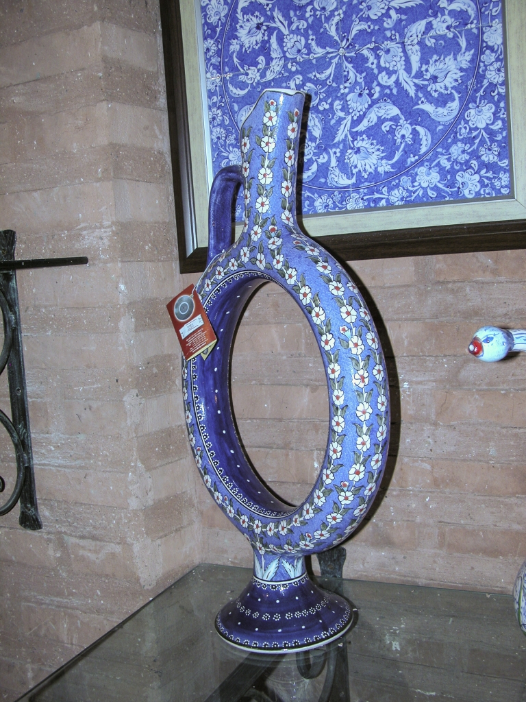 Decanter with Daisies
Complemented by the painting on the wall behind it - obviously they were hoping to sell the two as a pair.
