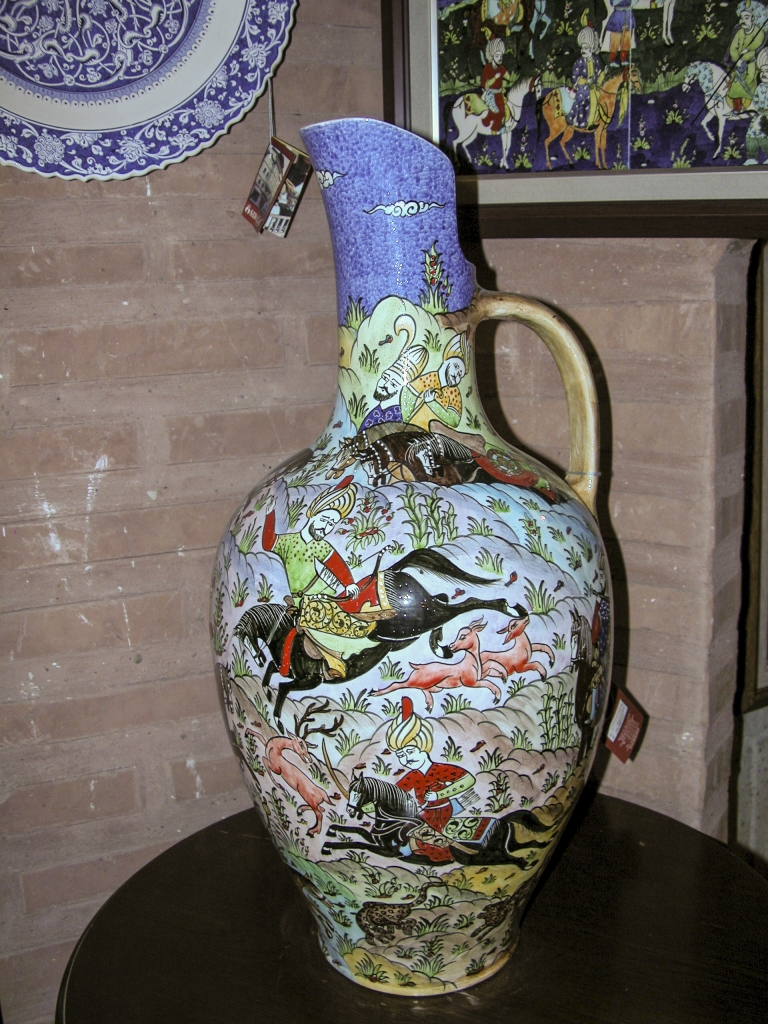 Hunting Scene
This finely painted jug featured Turkish noblemen on horseback pursuing various wild animals.
