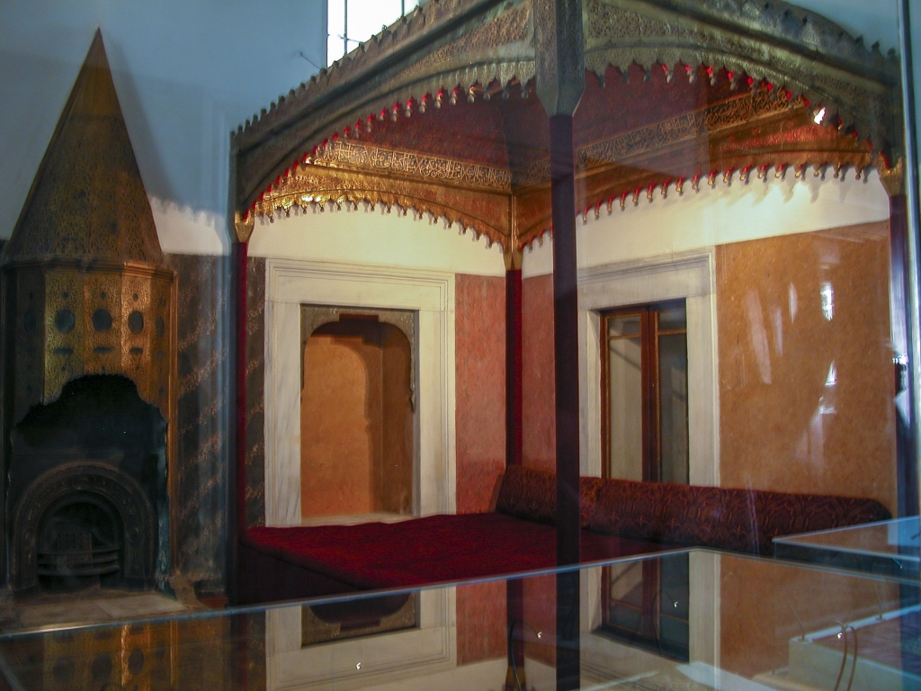 A Sultan's Comforts
A canopied bed by the fireplace.  I found the conical fireplaces a little bizarre, but I'm sure they kept the Sultan and his concubines warm.
