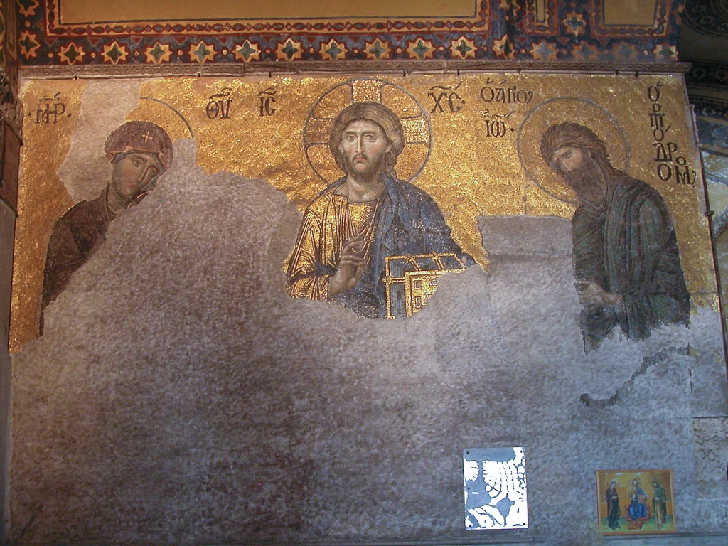 Deësis Mosaic
Deësis = Entreaty.  The Virgin Mary (left) and John the Baptist (right) are entreating Christ (center) to intercede for humanity on Judgment Day.  This mosaic was commissioned to celebrate the return of Aya Sophia to the Orthodox Church on the demise of the Latin Empire in 1261.

