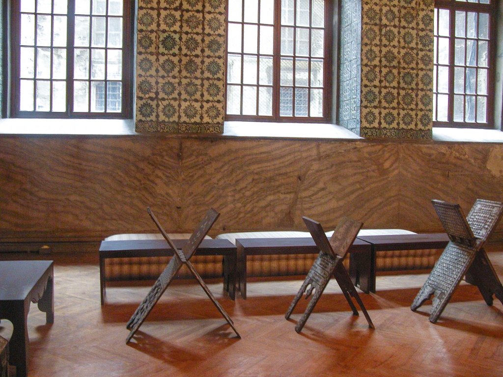 Reading room
The X-shaped wooden stands held books for readers sitting on the benches.
