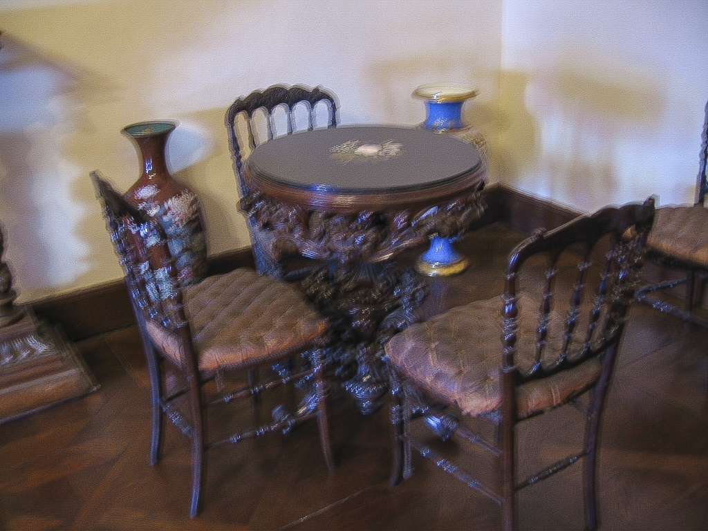 Table with Chairs
An ornate table in the harem, used for tea and tête-à-têtes.  Note the sultan's monogram on the tabletop.
