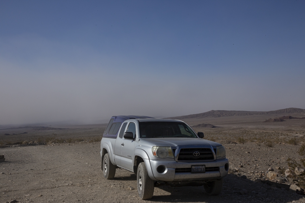 Boudika in Jeopardy?
Looks as if the dust storm will quickly advance up the hill and engulf JoAnn's beloved pickup in the Keane Wonder Mine parking lot, but it didn't.
