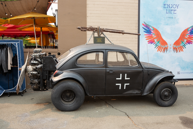 Brutal Beetle
This VW Beetle, made no earlier than 1957 as you can tell from the rear window, was made up to look like a German army weapons platform - not very convincingly; how would you aim and fire the machine gun on top?
