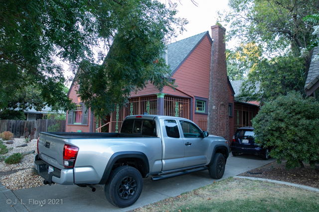 Oblique view with truck
The house is partly obscured by JoAnn's truck, but I was able to capture most of the chimney, which I found quite attractive.
