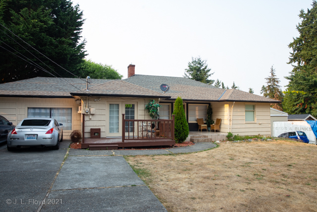 Bed and Breakfast
In Edmonds we stayed in a little studio apartment which shared the house pictured here.  Our quarters were on the left, identified by the "7713" on the door.
