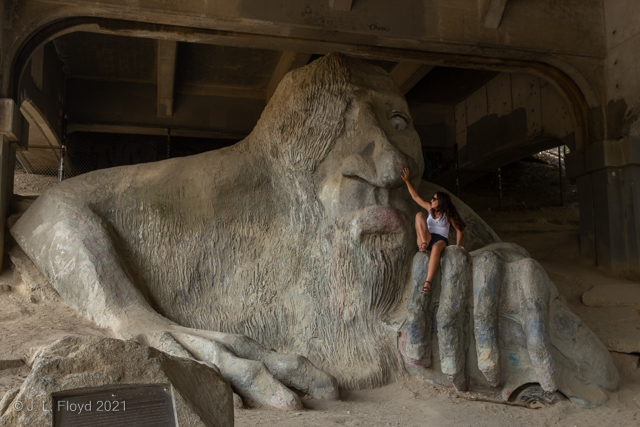 Troll with Abductee
This is about as close as I could get to an unobstructed view of the Fremont Troll.  At least the obstruction in this view is a comely young lass.

