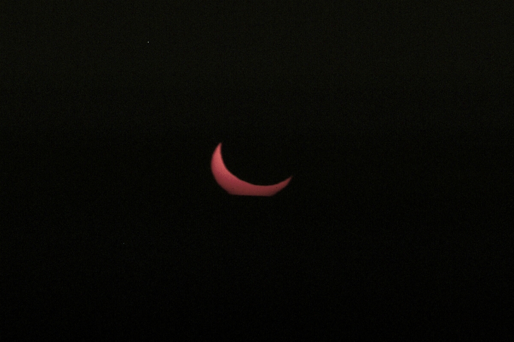 Post-Totality 3
The Sun hits the horizon, about a quarter through post-totality.
